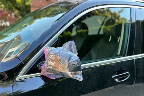 plastic bag over mirror car.